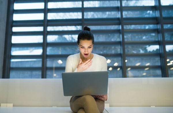 woman reading salary data